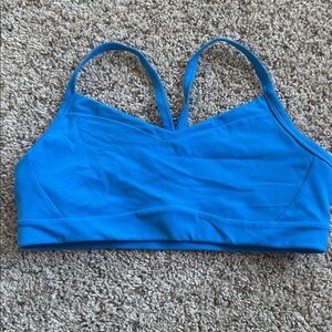 Athleta Women’s Vital Sports Bra in bright blue, size medium A-C cup